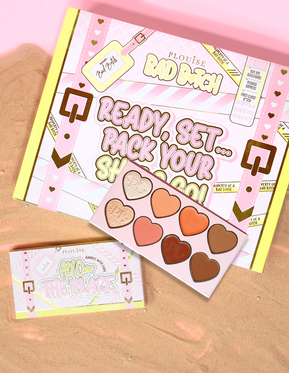 P.Louise All Over The Place Face Palette-verpakking en product weergegeven met hartvormige pan-tinten in verschillende kleuren op een zandbed.