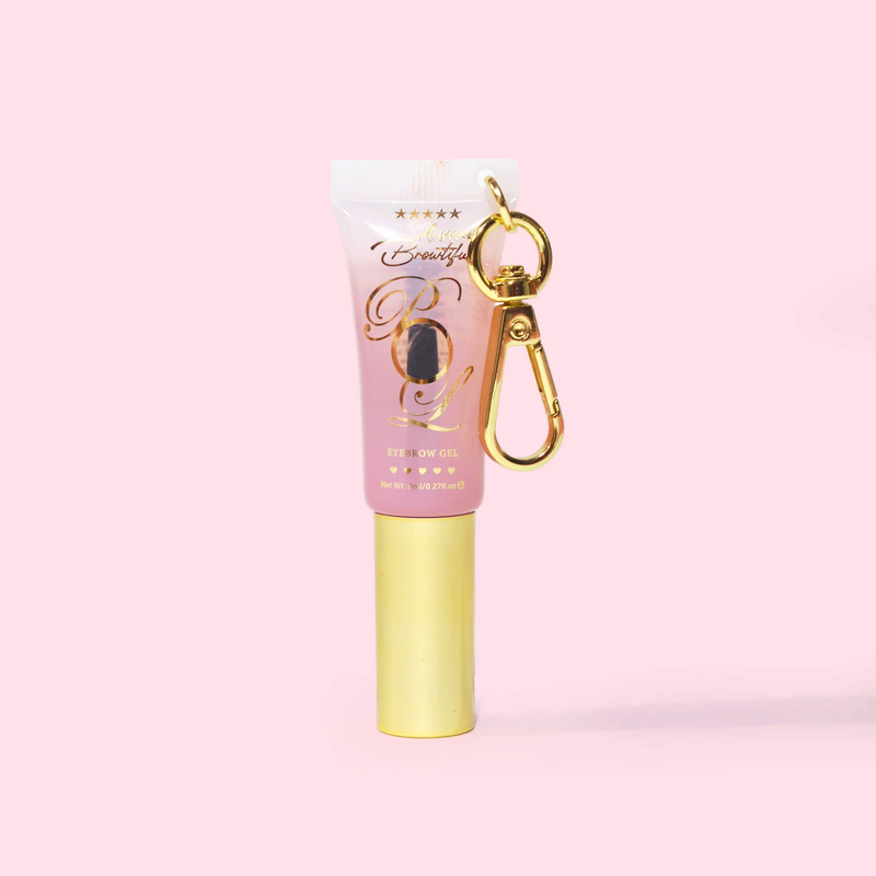 Mini tube P.Louise Babyccino Keychain heldere wenkbrauwgel op een roze achtergrond