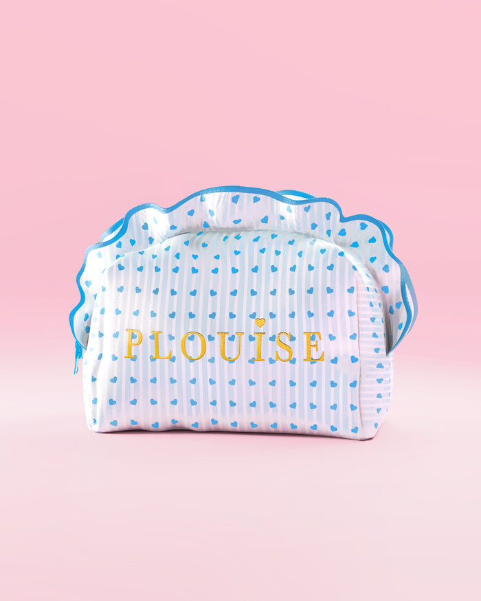Blauw-wit gestreepte make-up- en huidverzorgingstas van P.Louise met ruches en een blauw frambozendessin