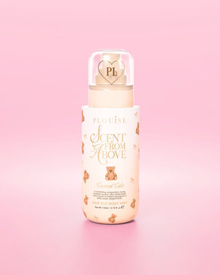 An image of the P.Louise Scent From Above Coconut Cake hair and body mist with a teddy design against a pink background