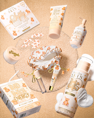 Collection of P.Louise Teddy Touch skincare products in coconut cake scent with decorative elements on a beige background