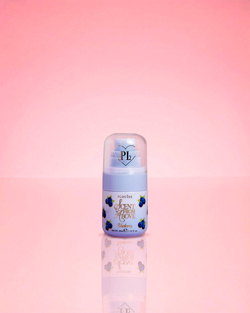 P.Louise Blueberry Mini Scent From Above Body Mist on a pink background