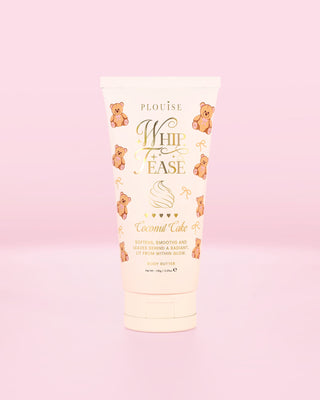 Bottle of the P.Louise Whip Tease coconut cake body butter with teddy design against a pink  background